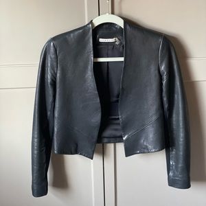 Alice + Olivia cropped black leather jacket with stretch knit detail